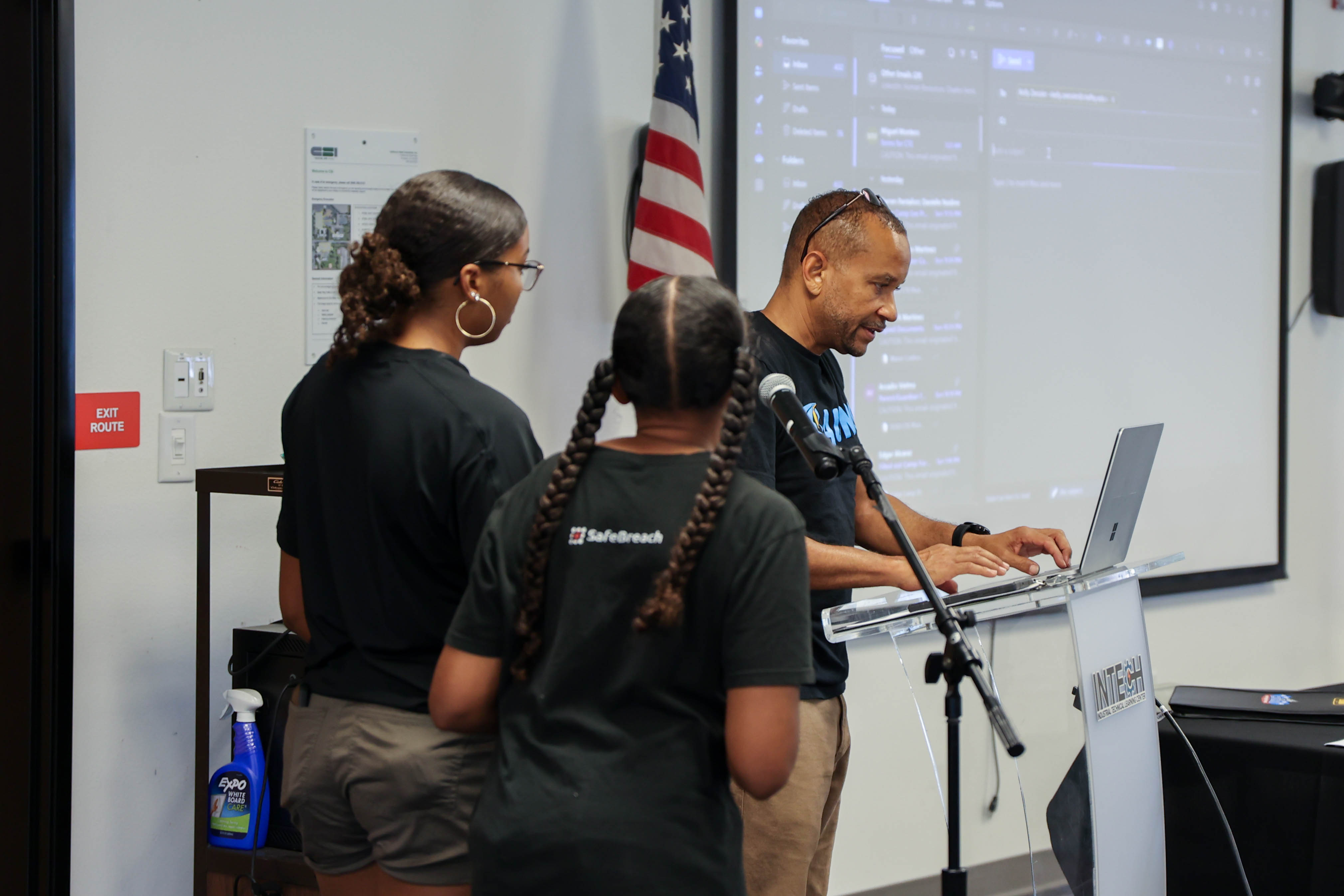 Students collaborating during Summer Cyber Camp